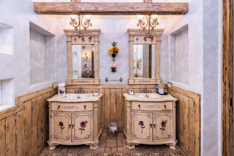 Separate tub and shower, jetted tub, designer toiletries, bathrobes