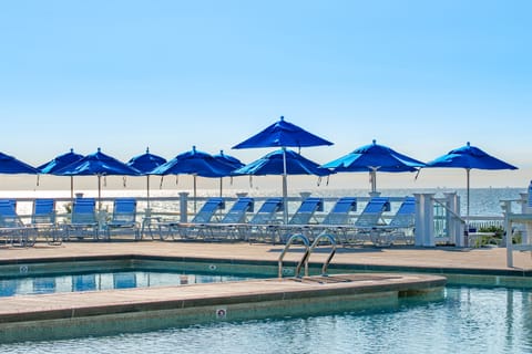 Seasonal outdoor pool, cabanas (surcharge), pool umbrellas