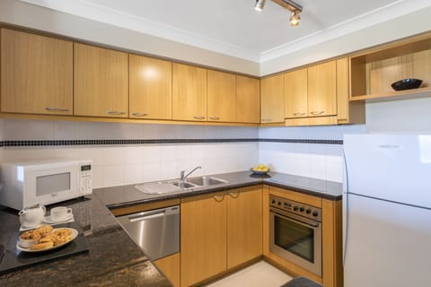 Three Bedroom Apartment with Two Bathrooms | Private kitchen | Fridge, microwave, stovetop, dishwasher