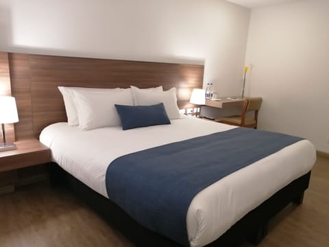 Superior Double Room | Minibar, in-room safe, blackout drapes, free WiFi