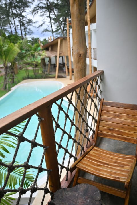 Room, 1 Queen Bed, Pool View | Balcony