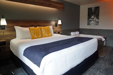 Signature Suite, 1 King Bed | Desk, blackout drapes, iron/ironing board, free WiFi