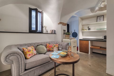 Honeymoon Apartment, 1 Bedroom (Boutique Apartment I Cavalieri) | Living area | 21-inch flat-screen TV with cable channels