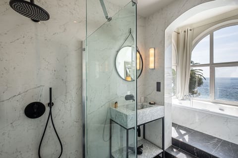 Suite, Jetted Tub, Sea View (Prestige) | Bathroom | Designer toiletries, hair dryer, bathrobes, slippers