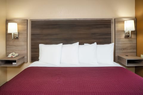 Standard Room, 1 King Bed | Premium bedding, individually decorated, individually furnished, desk