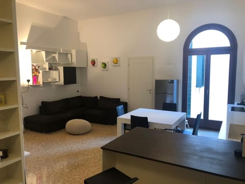 Apartment, Garden View | Living area | Flat-screen TV