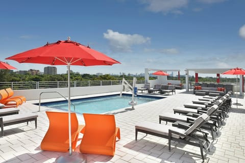 Outdoor pool, free cabanas, pool umbrellas