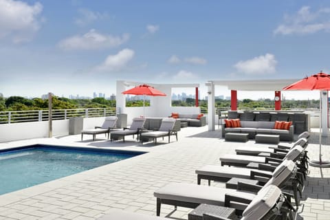 Outdoor pool, free cabanas, pool umbrellas