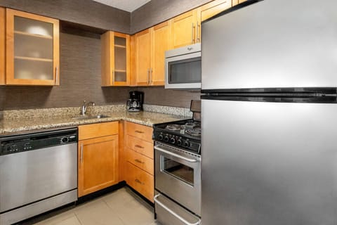 Suite, 2 Bedrooms, Fireplace | Private kitchen | Fridge, microwave, stovetop, dishwasher