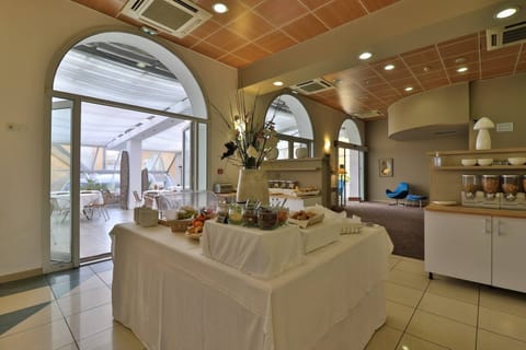 Daily buffet breakfast (EUR 18 per person)