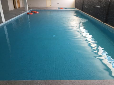 Indoor pool, sun loungers