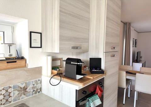 Comfort Room, Courtyard View | Private kitchen | Espresso maker, coffee/tea maker, electric kettle, toaster