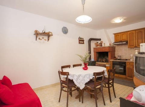 House (House B - 45 m from The Sea) | Living room | 32-inch flat-screen TV with cable channels