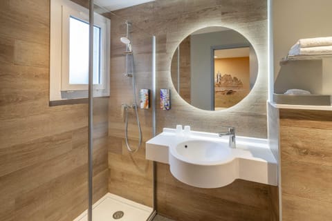 Shower, rainfall showerhead, hair dryer, towels