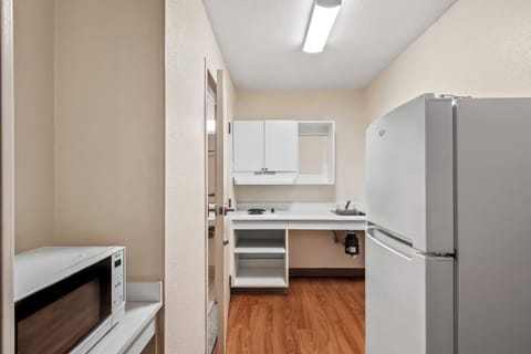 Studio, 1 Queen Bed, Accessible, Non Smoking | Private kitchenette | Fridge, microwave, stovetop, dining tables