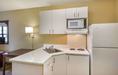 Studio, 1 Queen Bed, Non Smoking | Private kitchen | Full-size fridge, microwave, stovetop, coffee/tea maker