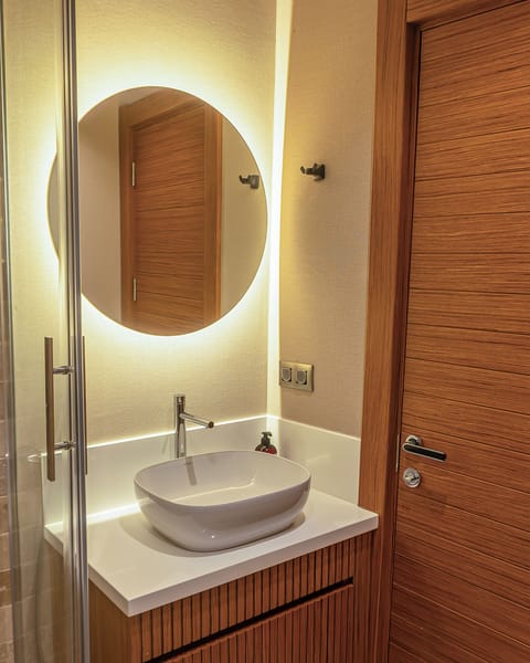 Frette Italian sheets, premium bedding, minibar, laptop workspace