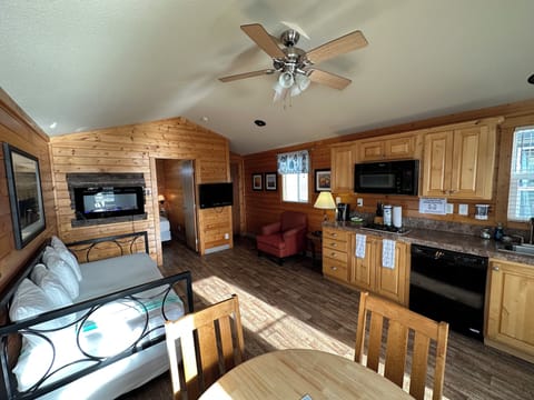 Cottage, 1 Bedroom, Kitchen, Water View | Living area | 32-inch flat-screen TV with cable channels, TV, fireplace