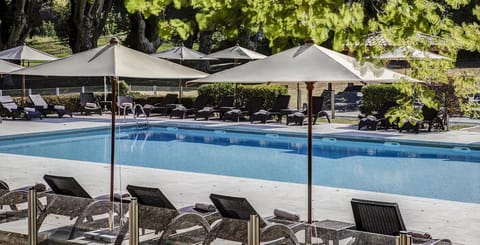 Seasonal outdoor pool, pool umbrellas, sun loungers