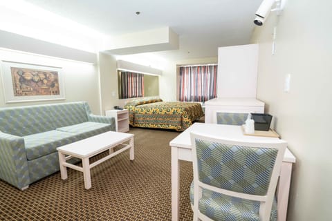 Deluxe Room, 1 King Bed, Nonsmoking | In-room safe, iron/ironing board, free WiFi, bed sheets