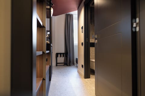 Junior Suite, Lake View | Minibar, in-room safe, desk, laptop workspace