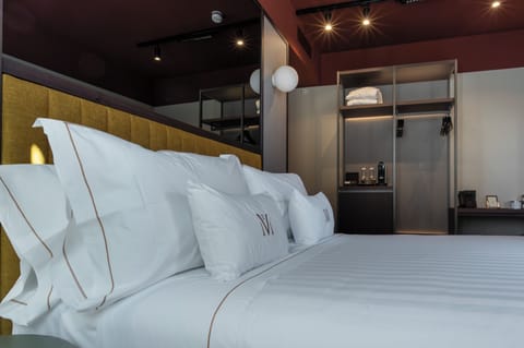 Deluxe Room, Partial Lake View | Minibar, in-room safe, desk, laptop workspace