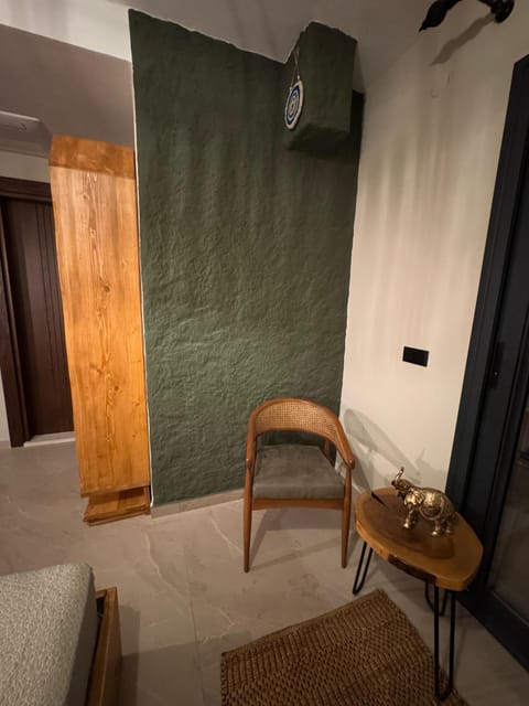 Deluxe Double Room, 1 Queen Bed, Balcony, Sea View | Living area | 37-inch LED TV with satellite channels