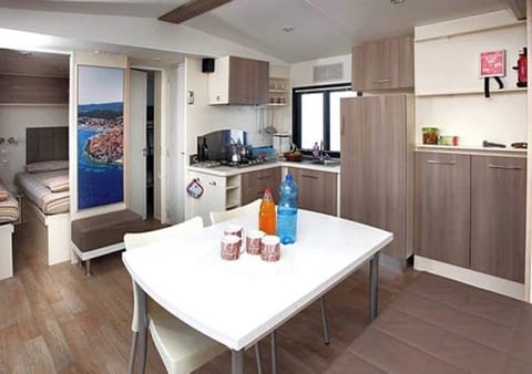 Comfort Mobile Home, 3 Bedrooms | Living area | 19-inch flat-screen TV with cable channels