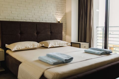 Family Quadruple Room, Balcony, Courtyard View | Soundproofing, free WiFi
