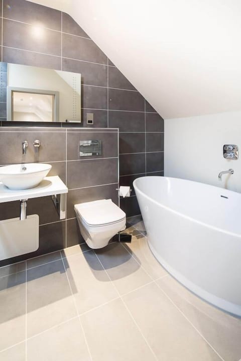 Hair dryer, towels, soap, shampoo