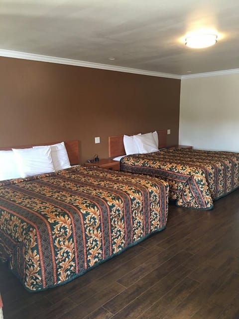 Desk, laptop workspace, free WiFi, bed sheets