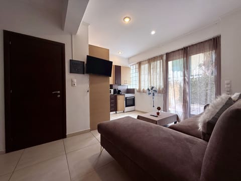 Apartment | Living area | 24-inch flat-screen TV with digital channels