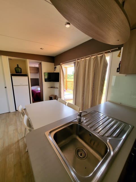 Mini-fridge, stovetop, espresso maker, coffee/tea maker