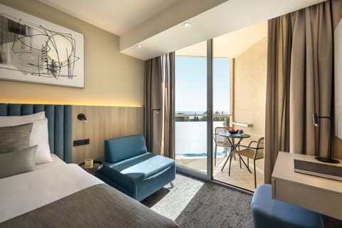 Superior double room with seaside balcony | Premium bedding, minibar, in-room safe, desk