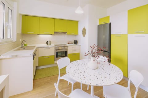 Apartment, Sea View | Private kitchen | Full-size fridge, microwave, oven, dishwasher
