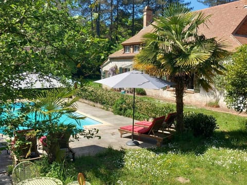 Seasonal outdoor pool, open 4:00 PM to 7:00 PM, pool umbrellas