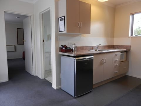 Family One Bedroom Apartment | Private kitchen | Microwave, coffee/tea maker, electric kettle