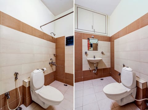 Executive Room, 1 King Bed | Bathroom | Shower, rainfall showerhead, free toiletries, bathrobes