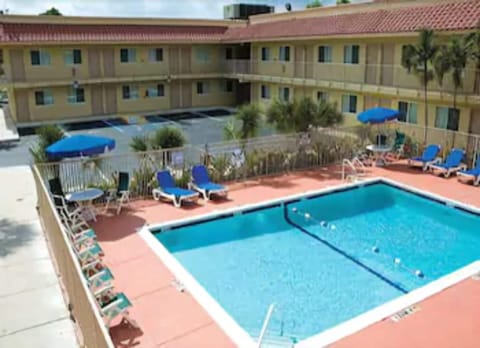 Outdoor pool, open 8:00 AM to 9:00 PM, sun loungers