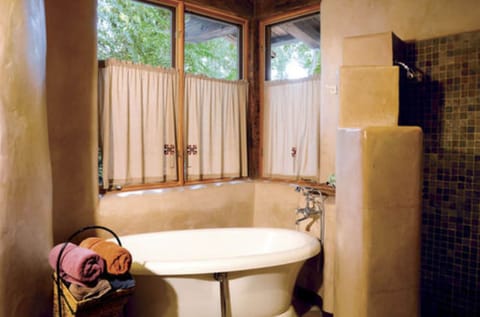 Shower, designer toiletries, hair dryer, bathrobes