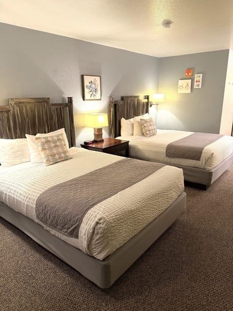Family Suite, 2 Bedrooms, Pets Allowed, Ground Floor | In-room safe, iron/ironing board, free WiFi, bed sheets