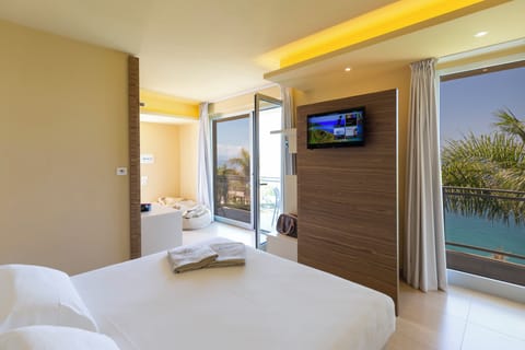 Deluxe Double or Twin Room, Sea View | Minibar, in-room safe, desk, free WiFi