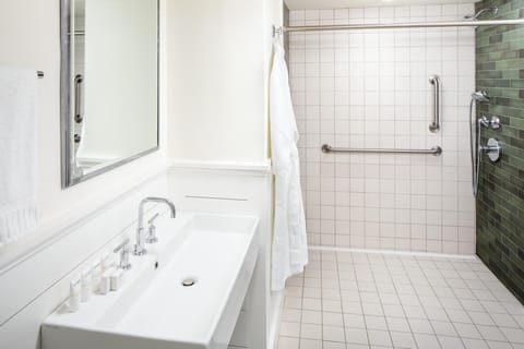 Grand Studio Suite | Bathroom | Designer toiletries, hair dryer, bathrobes, towels