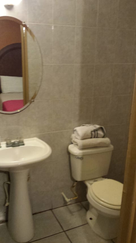 Single Room | Bathroom | Shower, free toiletries, towels