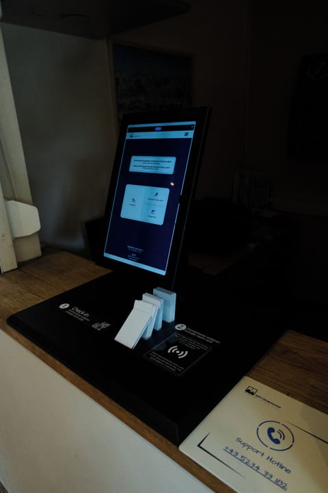 Check-in/check-out kiosk