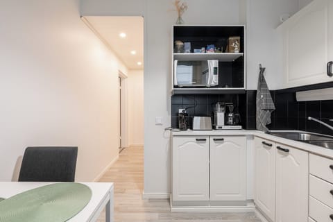 Comfort Apartment, Pets Allowed, Ground Floor | Private kitchen | Full-size fridge, microwave, oven, stovetop