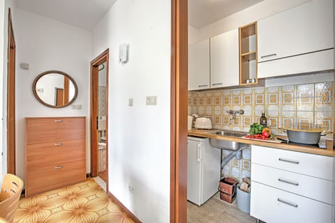 Standard Apartment, 1 Bedroom (Casa Silvia 50m From The Lake) | Private kitchen | Fridge, microwave, stovetop, coffee/tea maker