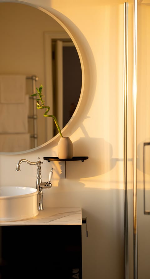 Shower, free toiletries, hair dryer, slippers