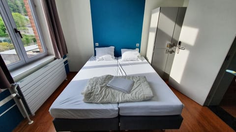 Twin Room, Shared Bathroom | In-room safe, soundproofing, free WiFi, bed sheets