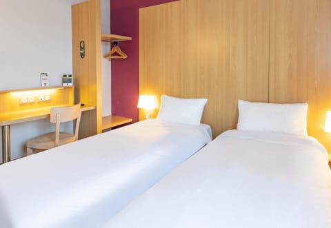 Premium bedding, desk, laptop workspace, soundproofing